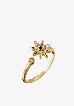 Guldfarvet åben ring med et solformet design i den ene ende og en lille rund gul ædelsten i den anden ende.