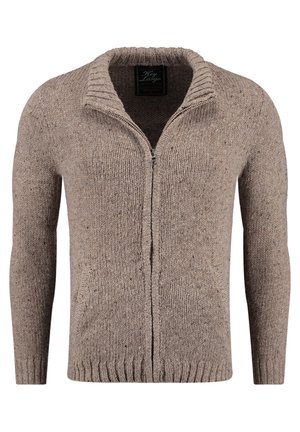 Pull en tricot beige zippé avec un col côtelé, des manches longues et des poches latérales. Tissu texturé avec des détails mouchetés.