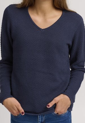 Marineblauer V-Ausschnitt-Pullover aus strukturiertem Strickstoff, mit langen Ärmeln und einer lässigen Passform.