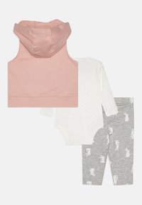 Three-piece baby outfit featuring a pink sleeveless hoodie, a white polka-dot long-sleeve bodysuit, and gray pants with bunny patterns.