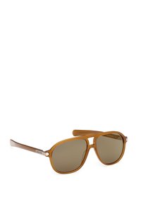 Bruna plastsolglasögon med rund form och bruna tonade linser. Har en metallaccent på bågarna med en logodetalj.