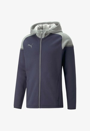 Sweat à zip bleu marine avec une capuche grise et des accents aux épaules, arborant un logo discret, des poches latérales et une texture de tissu douce.