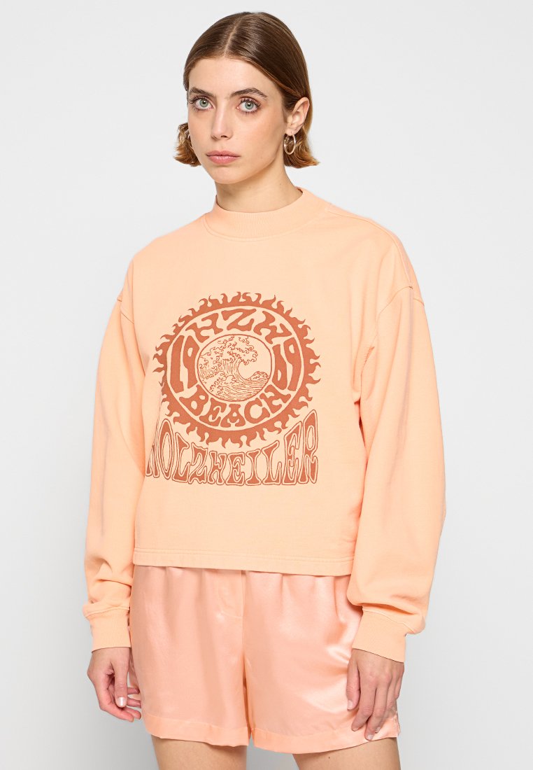 Holzweiler Sweater abrikoos