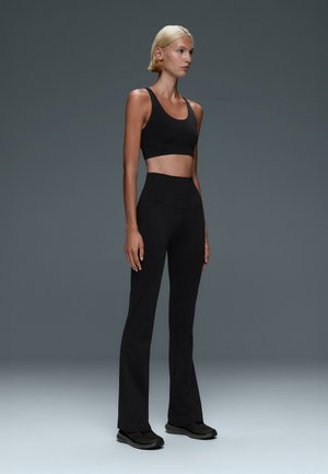 OYSHO, SUPER HIGH-RISE COMFORTLUX FLARE  - Tracksuit bottoms - black