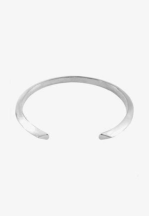 Silver cuff bracelet with a smooth, polished finish, open ends, and a simple, elegant design. No adornments or intricate patterns.