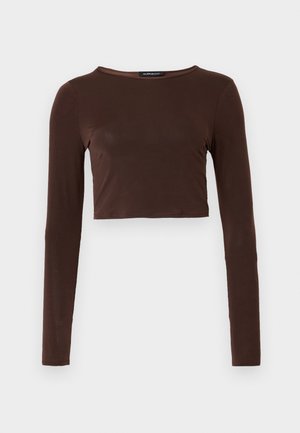 Brūns garo piedurknu kropts topiņš, izgatavots no gludas materiāla, ar apaļu kakla izgriezumu un pieguļošu dizainu. Nav redzamu rakstu vai akcentu.