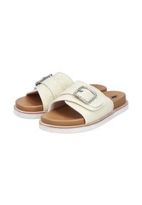 White woven slide sandals with a wide strap featuring a silver decorative buckle, tan footbed, and white rubber sole.