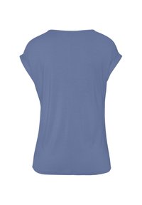 Camiseta corta de manga corta en azul con un corte holgado y escote redondeado, que presenta una textura suave y detalles de costura sutiles.