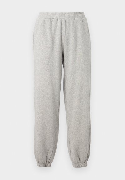 Gray sweatpants made of soft fabric with an elastic waistband and cuffs. The design features a straight shape and minimalistic style.