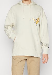 Tommy Jeans Mikina s kapucí - beige