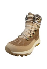 Bota de senderismo de invierno en tonos marrón y beige con suela gruesa, cuello tejido acolchado y cordones beige pasados por ojales de metal.