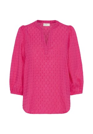 Blouse à manches longues rose vif avec des rayures verticales texturées, des poignets élastiques et un décolleté en V sans col.