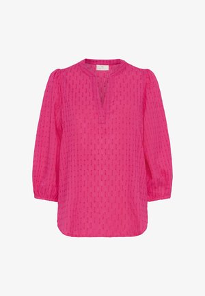 Blouse à manches longues rose vif avec des rayures verticales texturées, des poignets élastiques et un décolleté en V sans col.