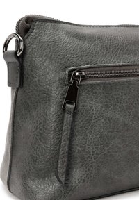 Gray leather bag with a textured surface, featuring a prominent zippered pocket and sleek black hardware accents. Compact, rectangular shape.