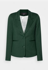 Tmavě zelený blazer vyrobený z hladké tkaniny, s výstřihem do V, dvěma předními kapsami a dvěma knoflíky. Podšívka se svislými sklady.