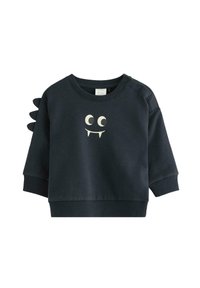Mørkeblå sweatshirt til småbørn med tryk af monsterøjne og tænder, samt tre stofpigge på venstre skulder.
