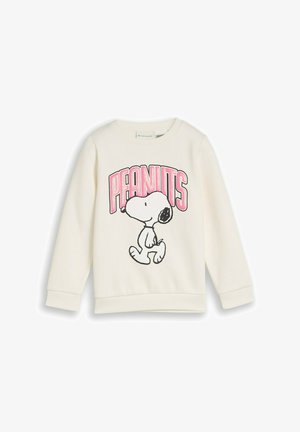 Biała bluza z długim rękawem z ilustracją Snoopy’ego idącego i słowem "PEANUTS" dużymi różowymi literami u góry.