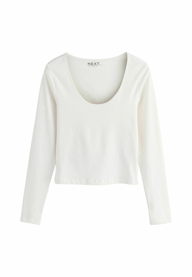 Witte lange mouwen top met een ronde halslijn, gemaakt van zachte katoenstof. Heeft een cropped ontwerp en een eenvoudige afwerking zonder patronen.
