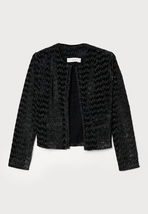 Veste cropped noire avec un motif texturé en zigzag, ornée de fils métalliques pour un effet scintillant. Sans fermeture, col rond et manches longues.