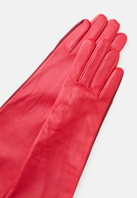 Red leather gloves with a smooth texture, long design, and fitted fingers. The interior features a contrasting darker color.