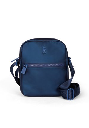Marineblaue Crossbody-Tasche mit vorderer Reißverschlusstasche, verstellbarem Riemen und USPA-Logo mit Polospieler.