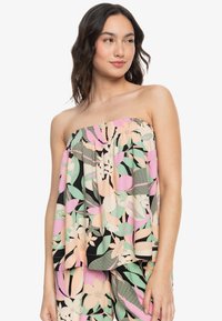 Trägersoses Oberteil mit schwarzem Grundton, das mit einem Blumenmuster in Pink, Mint und Creme verziert ist. Hergestellt aus leichter Stoffqualität mit gerafftem Gummiband am Ausschnitt.
