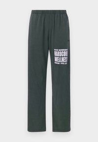 HARDCORE WELLNESS PANTS UNISEX - Verryttelyhousut - faded black