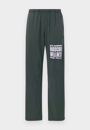 HARDCORE WELLNESS PANTS UNISEX - Tracksuit bottoms - faded black