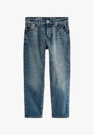 Lõdva lõikega sinised teksad, mis on pleekinud, viie taskuga, metallist nurgarootside ja nööbiga kinnitusega. Sirge jalgade disain, ilma lisakaunistusteta.