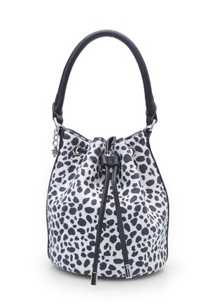 Bucket bag featuring a white fabric with black leopard spots, a black leather handle, and drawstring closure with silver hardware accents.