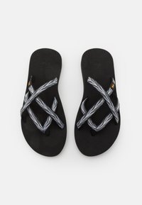 Black flip-flops with a textured sole and crisscross straps featuring a grey leaf pattern. Accented with an orange logo.