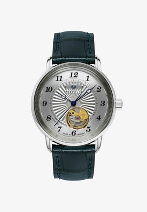 Zeppelin Automatikuhr mit einem silbernen strukturierten Zifferblatt, blauen Zeigern, schwarzen arabischen Ziffern und einem dunkelgrünen Lederarmband. Sichtbare Bewegungselemente.