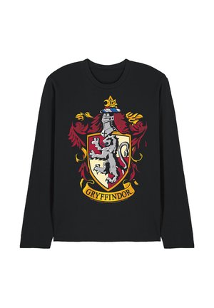Schwarzes Langarmshirt mit dem Wappen des Hauses Gryffindor, das einen Löwen, einen Helm sowie rote und goldene dekorative Elemente auf der Vorderseite zeigt.