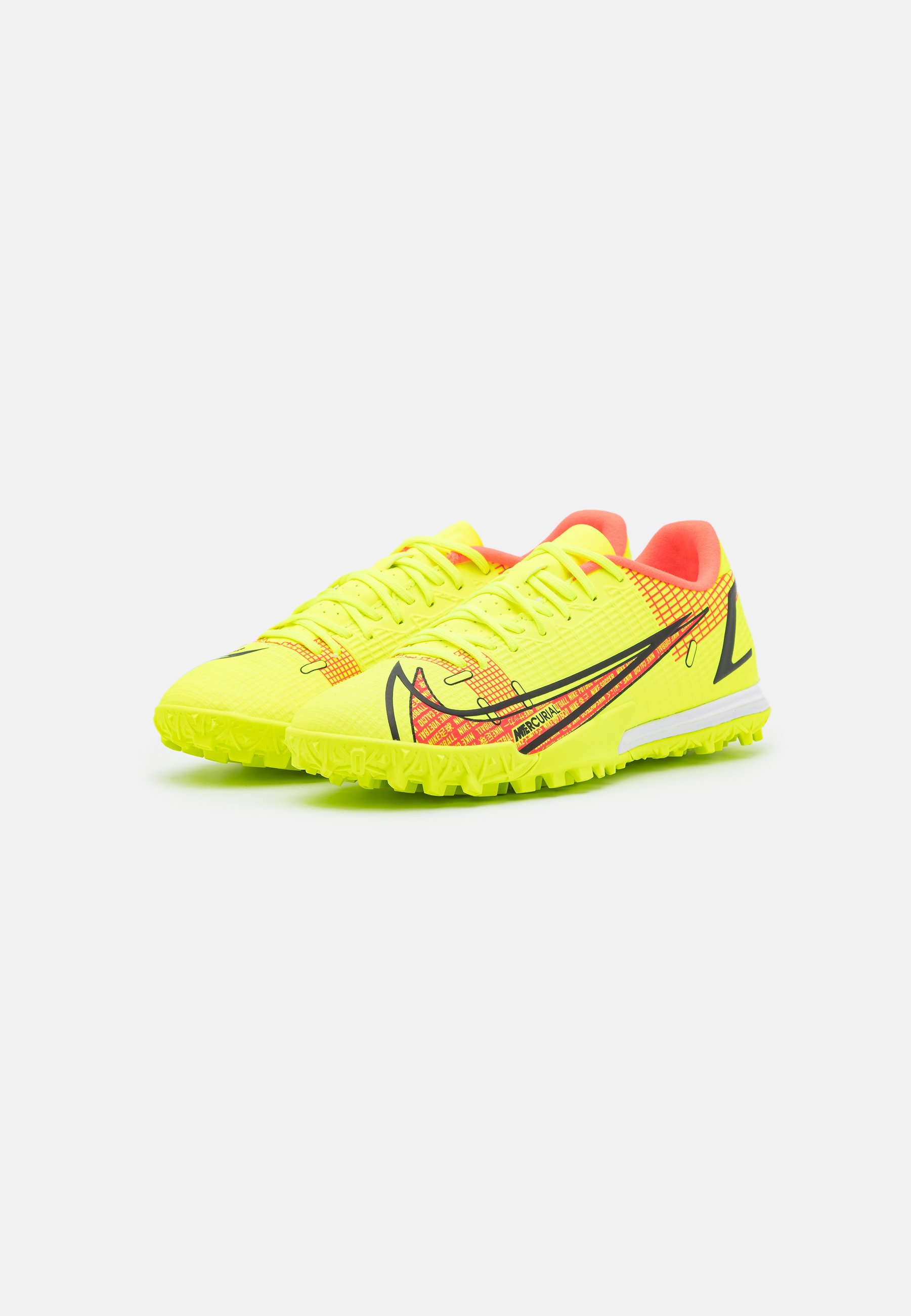 yellow nike astro turf