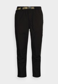 Pantaloni neri con una texture leggera e liscia, caratterizzati da una cintura beige di Calvin Jeans e un design a gamba affusolata.