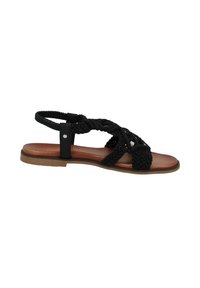Zwarte gevlochten sandalen met een vlakke zool, met een bruine binnenzool en zwarte synthetische banden. Minimalistisch ontwerp zonder zichtbare hardware.