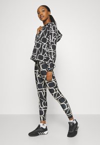 ONLY Play FONT LOGO TRAIN - Tights - black