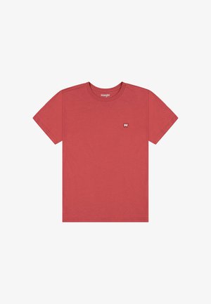 Röd kortärmad t-shirt i bomull med rundad halsringning. Har en liten vit logotyp på vänster bröst. Slät textur och avslappnad passform.