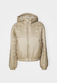 Beige quilted puffer jacket with a hood, featuring a front zipper, elastic cuffs, and textured panels on the sleeves and body.