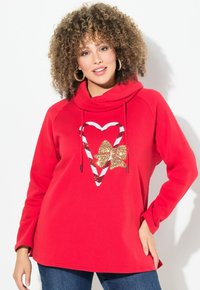 Felpa rossa con collo a cowl, caratterizzata da un design con cuore e fiocco in paillettes dorate e bianche. Tessuto morbido e vestibilità rilassata. Maniche lunghe.