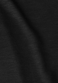 Black textured fabric with a fine, slightly ribbed pattern and subtle sheen. Soft, pliable material, evenly woven with minimal variations.