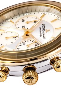 Orologio cronografo con cassa in oro e argento, quadrante crema con tre sottodial e indici delle ore dorati. Include una corona testurizzata.