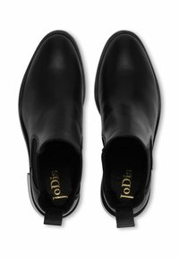 Black leather ankle boots with elastic side panels, rounded toe, and pull tab at the back. Interior features gold brand logo on black lining.