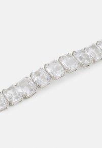 Clear gemstone bracelet with rectangular stones set in silver-tone metal. Features multiple facets and an even, polished surface.