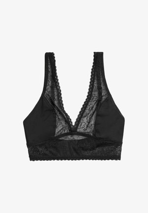 Bralette negro hecho de tela suave con una superposición de encaje. Presenta un diseño de escote en V, bordes de encaje con borde en forma de ondas y un patrón floral en el encaje.