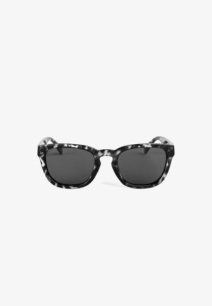 Sunglasses with black and white marbled acetate frames, dark lenses, rectangular shape, and slightly curved edges.