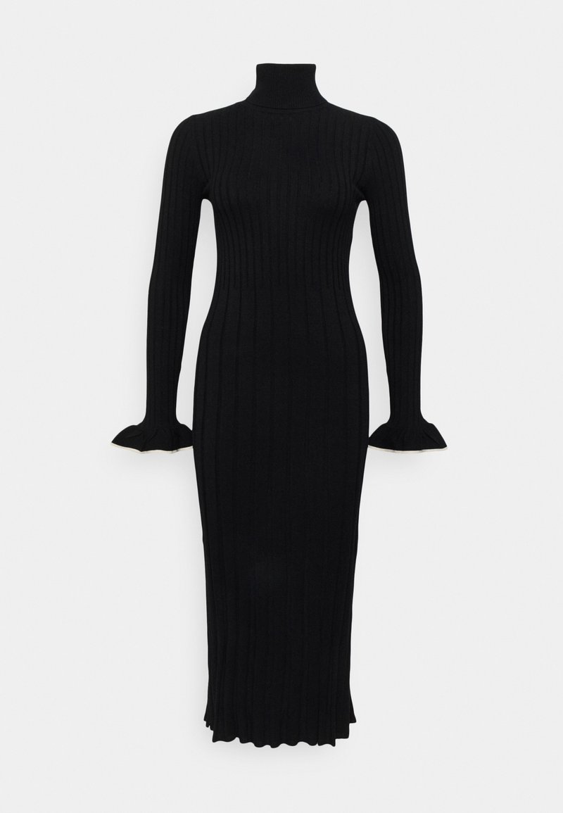 Černé žebrované pletené šaty s vysokým výstřihem, dlouhými rukávy a rozšířenými manžetami, s těsným střihem a délkou po lýtka.