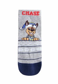 Gray sock featuring a cartoon dog character with brown fur and a blue hat. It has red "CHASE" text and white snowflake patterns on stripes.