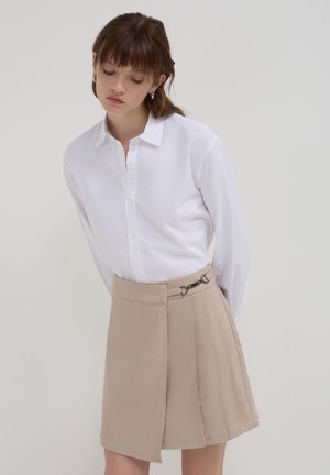 Pleated skirt - beige
