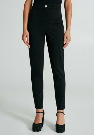 Spodnie materiałowe